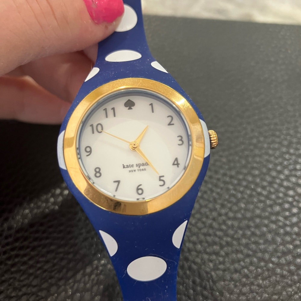 Kate Spade watch.  Navy blue with white polka dots.  Silicone band.